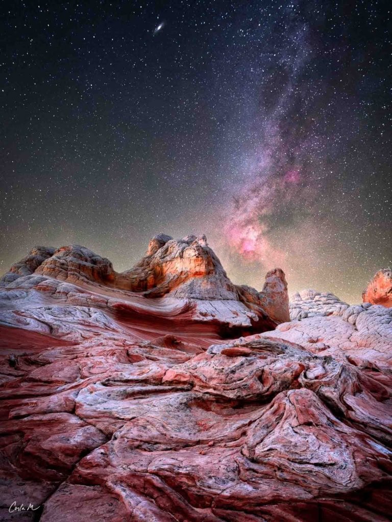 White Pocket Arizona astrophotography with the Milky Way and Cygnus region over swirling sandstone rock formations.