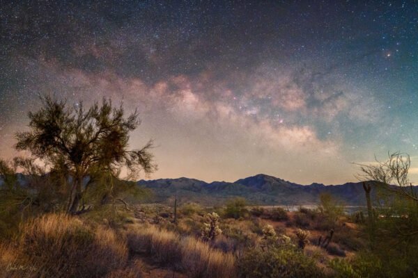 Fine Art print of the Milky Way and a starry night over desert landscape.