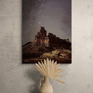 Hite Cliff image displayed on a wall above a table