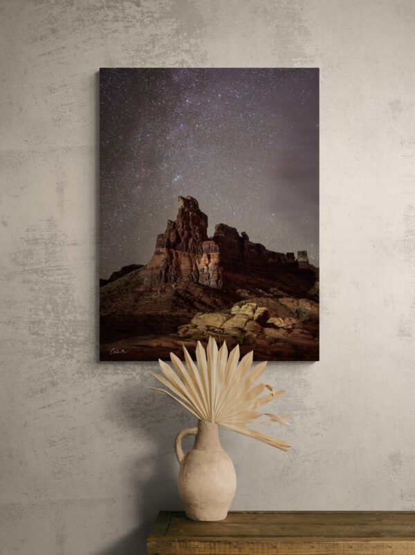 Hite Cliff image displayed on a wall above a table